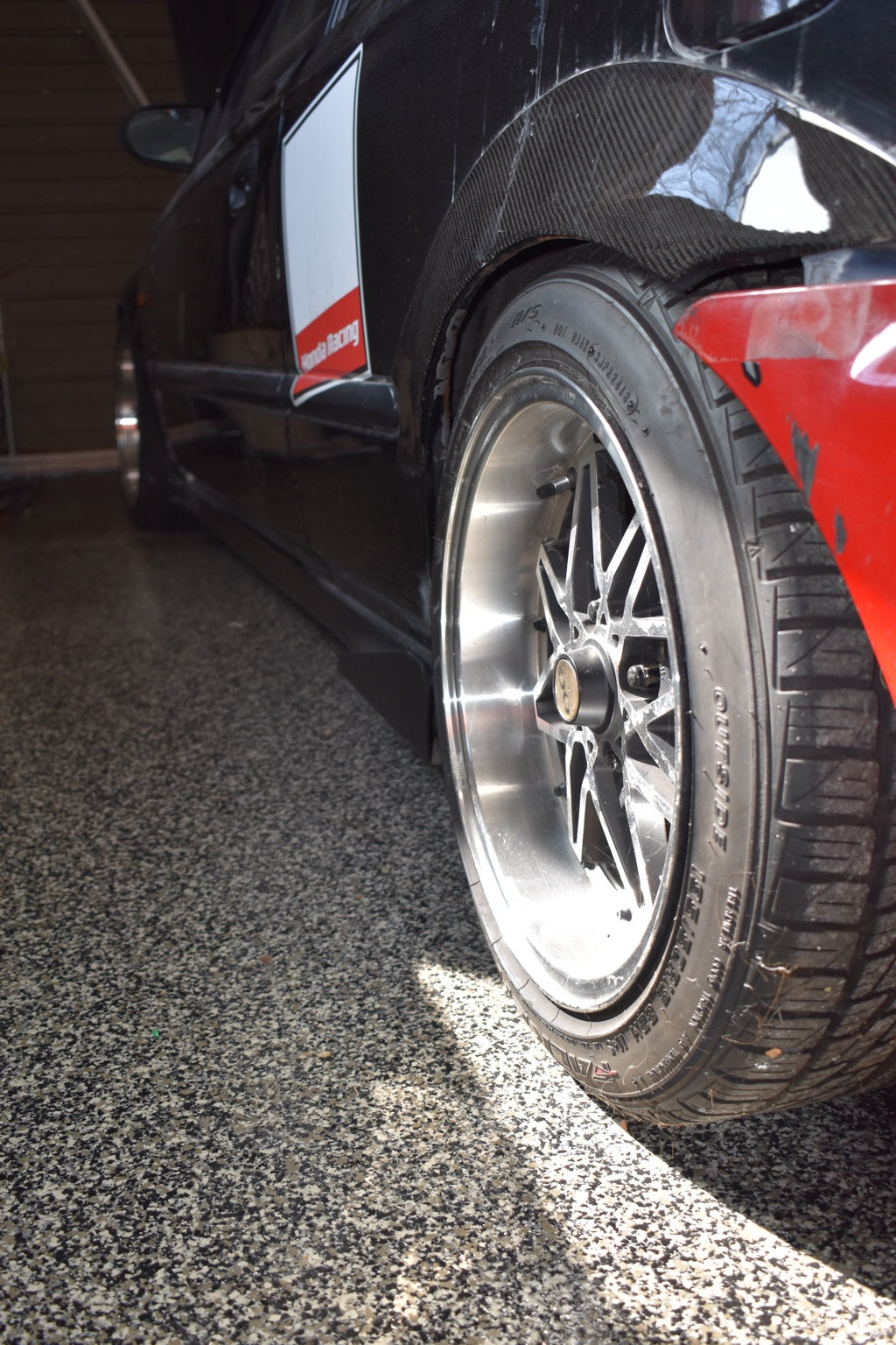 State of Exotic 1999 Civic EK rear wheel and carbon body detail